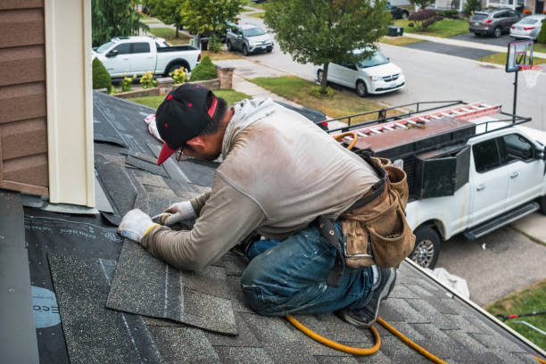 Professional Flat Roof Repair technician working in Manchester, NY
